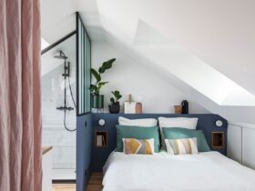 Attic Bedroom With Space Saver Sofa and Minimalist Decorations